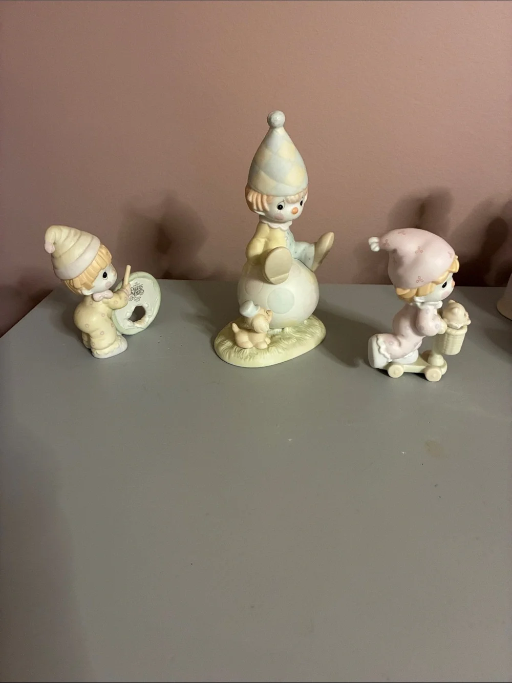 Precious Moments Three-Piece Pastel Figurine Set in Cream and Pink